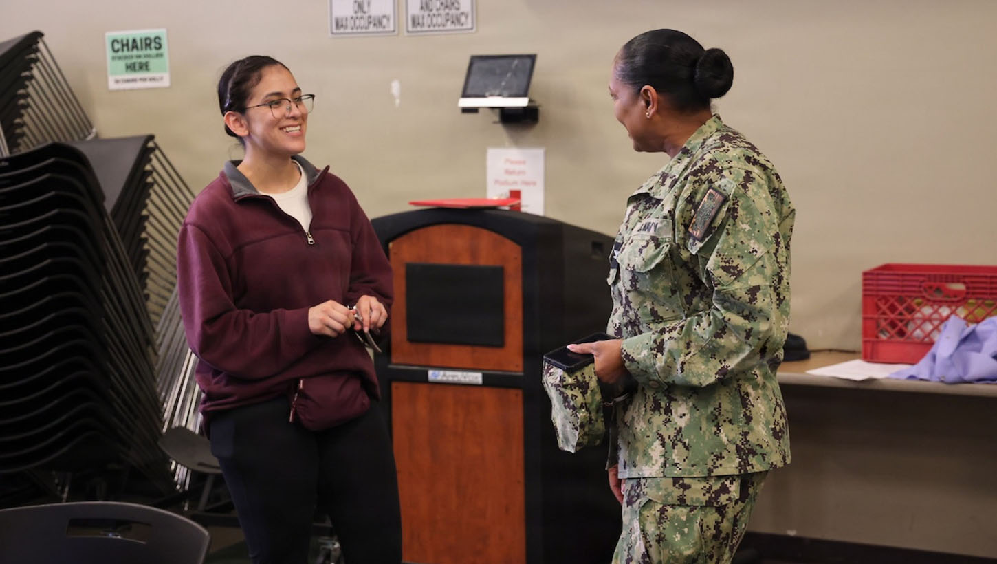 Capt. Janiese Cleckley (right), commanding officer of the Navy Medicine Readiness and Training Command Twentynine Palms and director of Naval Hospital Twentynine Palms, meets with staff and donors during a record-breaking blood drive