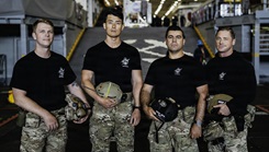 The U.S. Navy dive medical team with Explosive Ordnance Disposal Group ONE (EODGRU-1) pose for a group photo