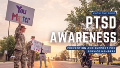 Military personnel holding encouraging signs 