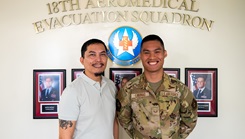 U.S. Air Force Senior Airman Angelo Libunao, 18th Aeromedical Evacuation Squadron AE technician, right, stands alongside his father, retired Senior Master Sgt. Jose Libunao, at Kadena Air Base