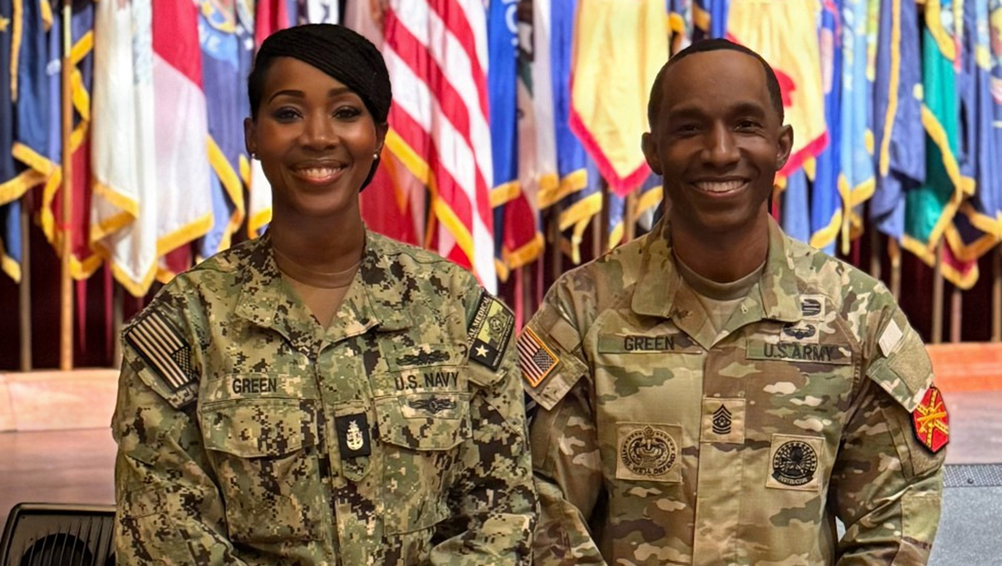 Twins, U.S. Navy Senior Chief Hospital Corpsman Vanessa Green, senior enlisted leader, education and training, Naval Medical Forces Development Command, and U.S. Army Environmental Command Command Sgt. Maj. Vincent Green pose for a photo