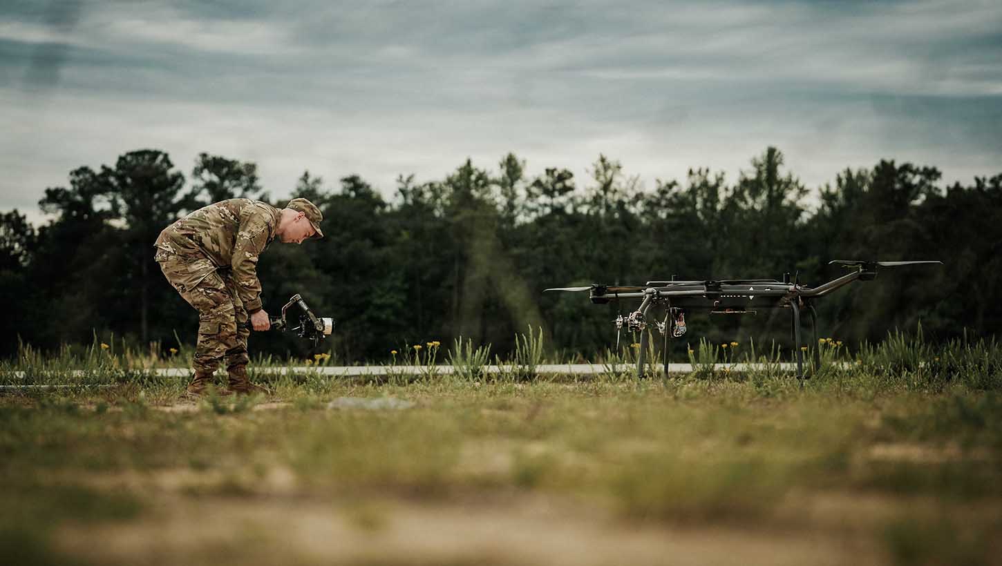 Army Sgt. Noe Cork, a paratrooper assigned to the Headquarters and Headquarters Battalion, 82nd Airborne Division, records footage of a tactical drone