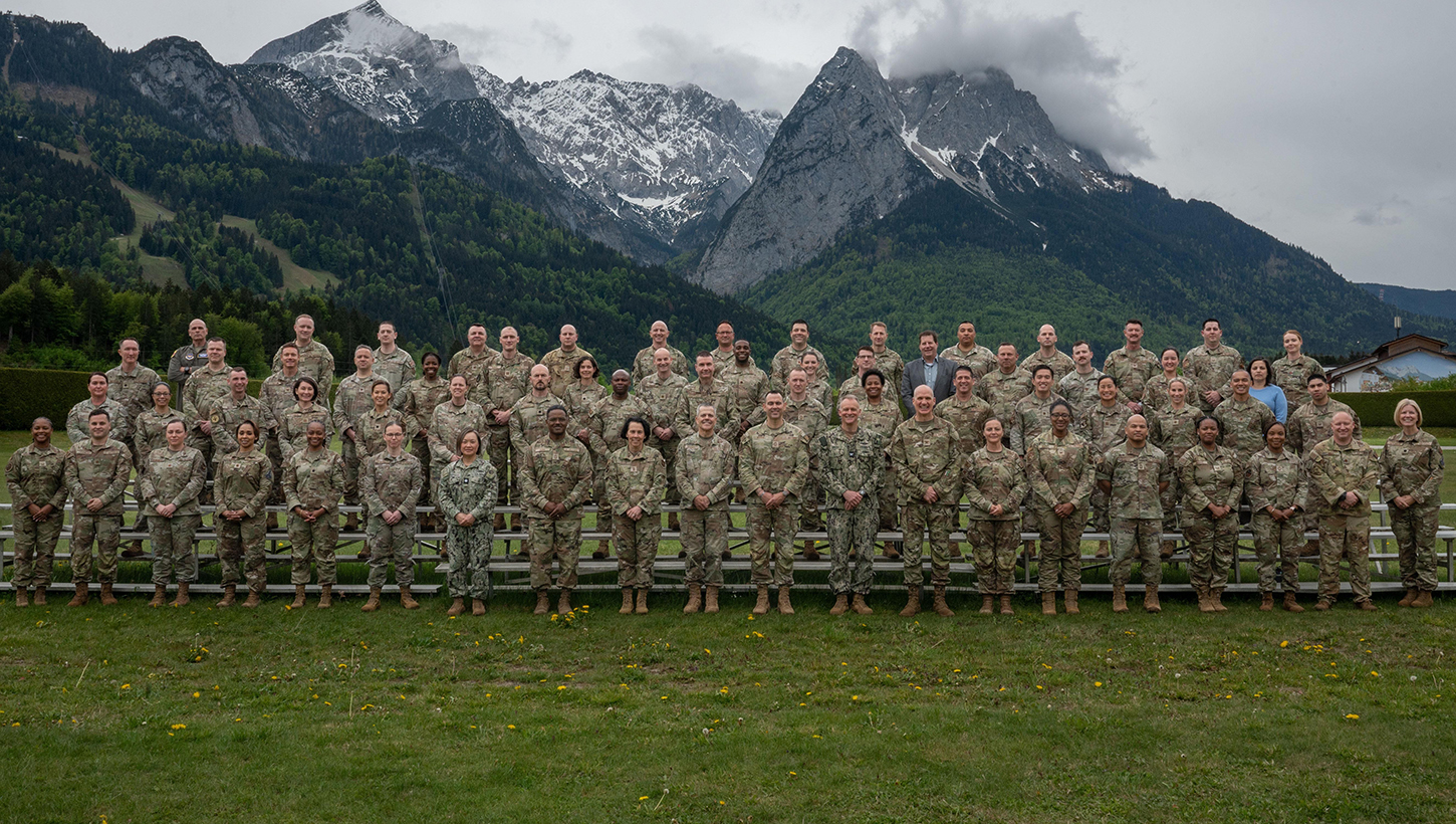 U.S. Department of War medical leaders and joint partners pose for a group photo