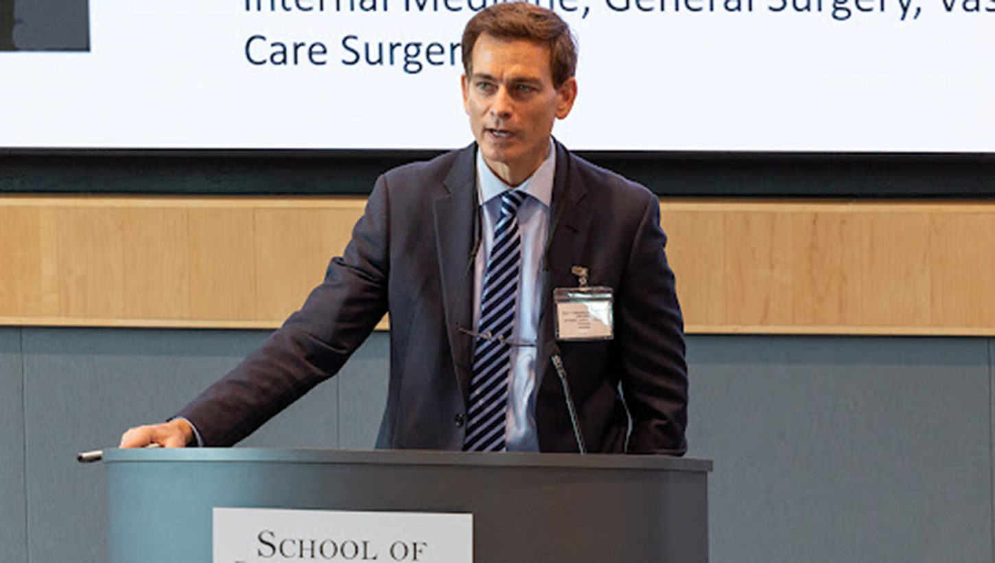 Dr. Paul Pasquina, director of the Center for Advanced Research for Military Optimization, Readiness, and Rehabilitation (ARMORR), delivers remarks at the Uniformed Services University of the Health Sciences