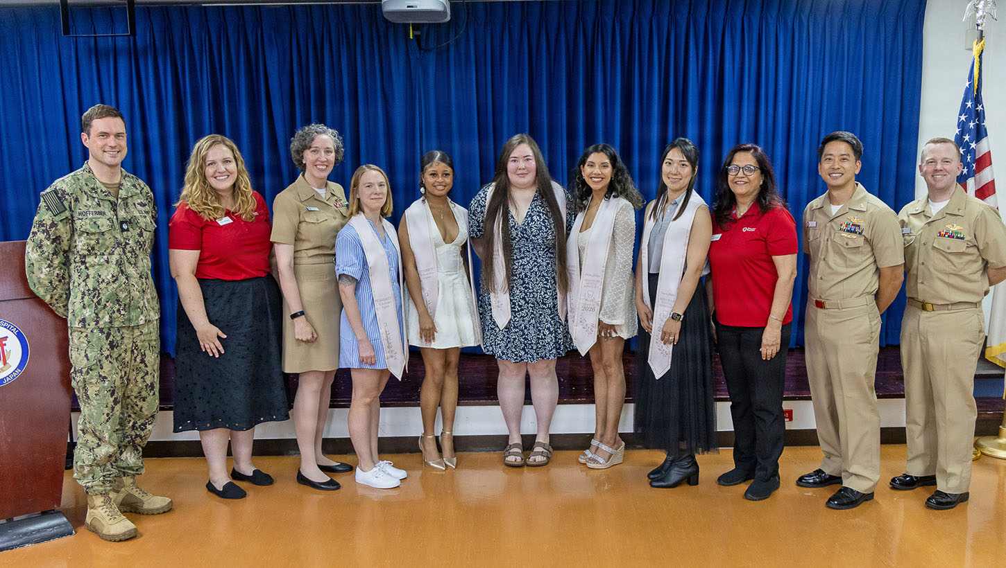 Participants, instructors, American Red Cross representatives and staff from the Directorate of Dental Services pose for a group photo during a Red Cross Dental Assistant Program recognition ceremony 