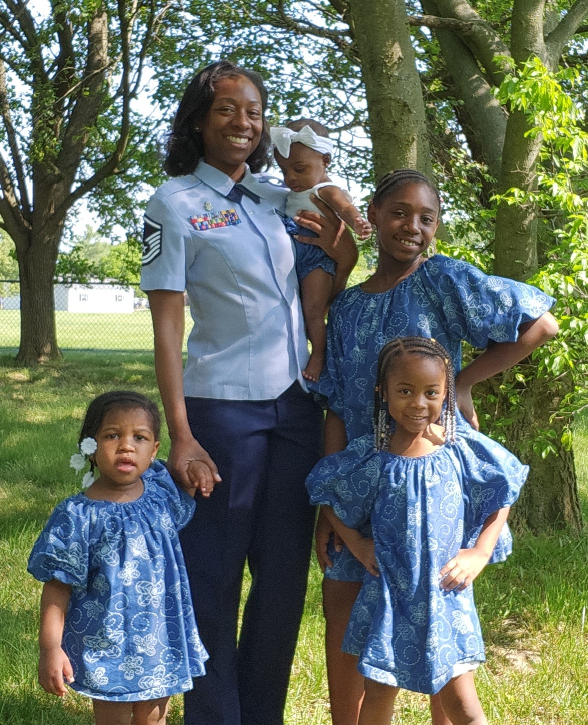 United States Air Force MSgt Shanelle Sampson and daughters