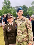 Command Sgt. Maj. Kalani Kalili stands with her youngest son, Pfc. Israel Kalili