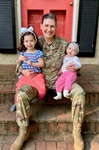 U.S. Air Force Col. Leigh Johnson with daughters
