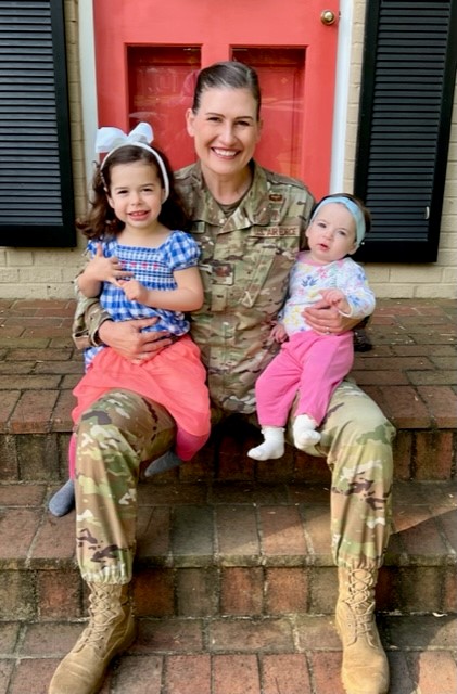 United States Air Force Colonel Leigh Johnson with daughters