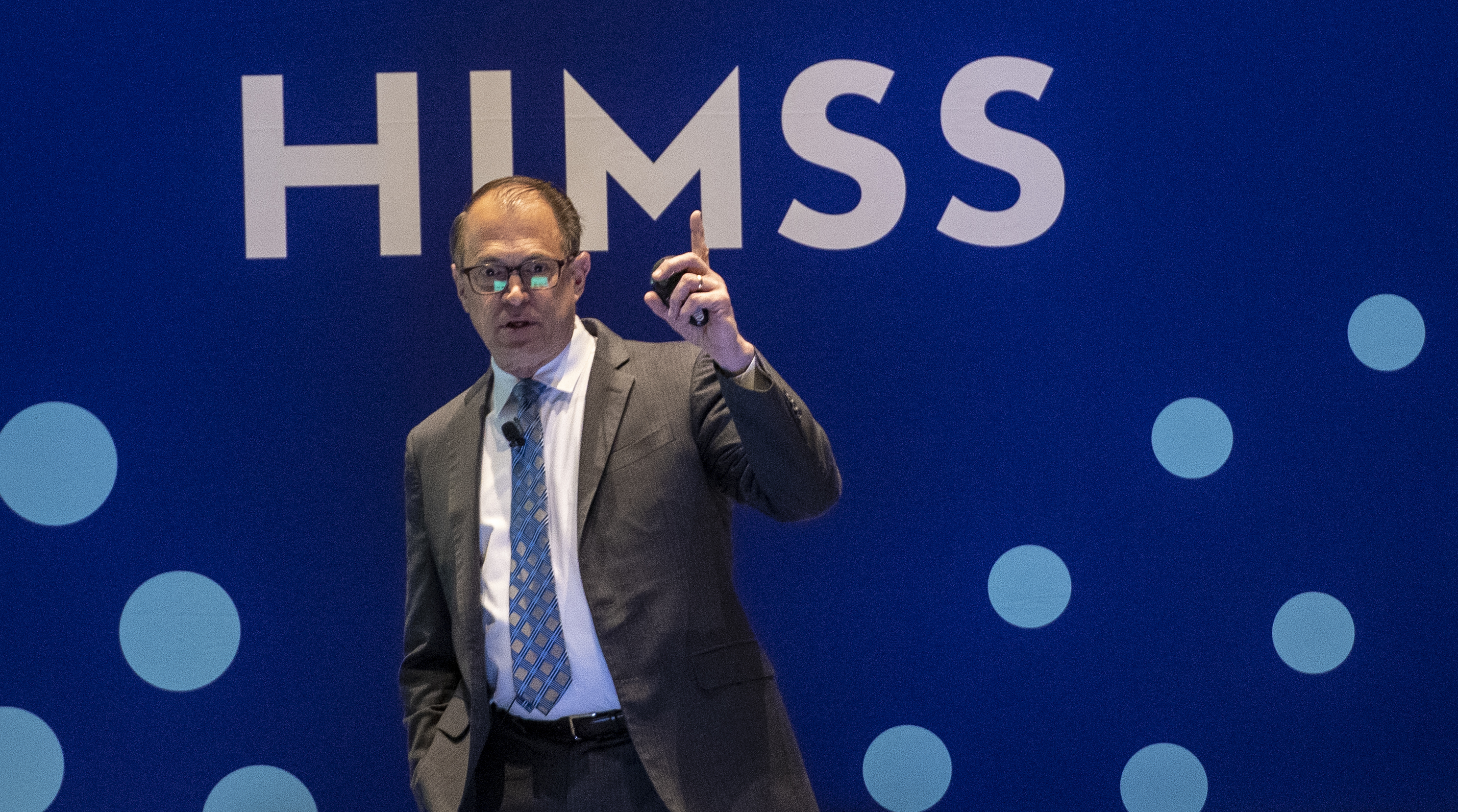 Image of Lein speaks at HIMMS 2023.