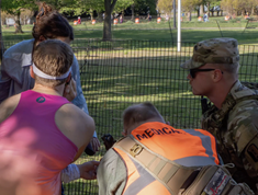 A Mississippi National Guard Soldier helps with a medical emergency in Washington, D.C.