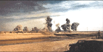 Figure 24.  Continuing demolition on March 4th at Khamisiyah (from 307th Engineer Battalion observation point, looking southeast)