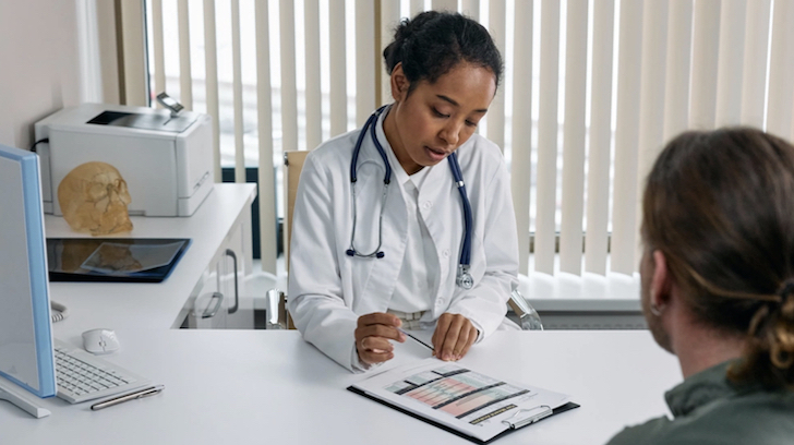 TRICARE Formulary Hero Image Doctor with Patient