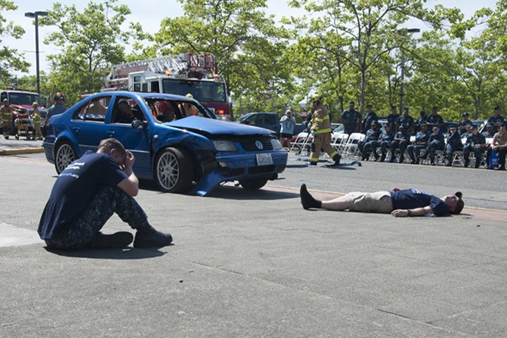 Image of Sailors simulate a drunk driving accident.