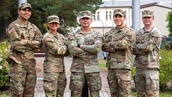 A team of 5 Soldiers from Medical Readiness Command, Europe will represent Army Medicine at the 2025 U.S. Army Best Squad Competition taking place at Fort Bragg, N.C. Oct. 2-15. Pictured from left to right are Spc. Ricardo Delgado, Spc. Selena Castro, Sgt. 1st Class Jon Nicolas, Sgt. Rico Elliot and Spc. Riley McMurren.