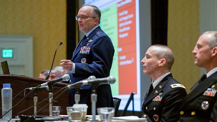 Air Force Maj. Gen. Lee Payne, assistant director of DHA's Combat Support Agency, moderates a panel presentation on Wednesday, August 21 at MHSRS. (MHS photo)