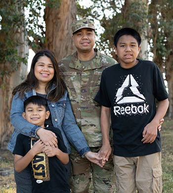 Air Force Tech. Sgt. Moses J. Villagomez, 60th Maintenance Group quality assurance inspector, poses with his wife and children April 22, 2021, at Travis Air Force Base, California. April is the Month of the Military Child, providing Travis with an opportunity to highlight the resilience of children in the military community. (Photo: Hun Chustine Minoda, 60th Air Mobility Wing Public Affairs)