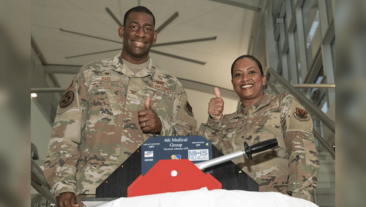 Image of Air Force Col. Dolphis Hall, 4th Medical Group commander, left, and Chief Master Sgt. Kaleah Belin, 4th MDG senior enlisted leader, pose for a photo at the Thomas Koritz Medical Clinic at Seymour Johnson Air Force Base, North Carolina, March 19, 2022. (Photo: Air Force Senior Airman Kimberly Barrera). Click to open a larger version of the image.