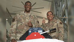 Air Force Col. Dolphis Hall, 4th Medical Group commander, left, and Chief Master Sgt. Kaleah Belin, 4th MDG senior enlisted leader, pose for a photo at the Thomas Koritz Medical Clinic at Seymour Johnson Air Force Base, North Carolina, March 19, 2022. (Photo: Air Force Senior Airman Kimberly Barrera)