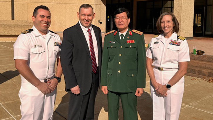 BETHESDA, Md. (Sept. 09, 2024) Leadership with Navy Medicine Research and Development (NMR&D), Vietnam Military Medical University (VMMU) and Uniformed Services University (USU) pose for a photo following the signing of a Statement of Intent (SOI). The SOI, signed by VMMU and USU, and facilitated by staff from Naval Medical Research Unit (NAMRU) INDO PACIFIC, aims to enhance collaboration between the U.S. and Vietnam in military medicine, through joint efforts in medical training, scientific research and academic cooperation. NAMRU INDO PACIFIC, part of NMR&D, conducts research in cooperation with host nations in Australia, Korea, Laos, Malaysia, Mongolia, Papua New Guinea, Singapore, Thailand and Vietnam to improve global health, ensure military force health protection and address infectious diseases such as malaria, dengue fever virus and gastro-intestinal pathogens. (Courtesy photo/Uniformed Services University)