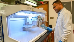Yantenew Gete, a contract scientist with Chenega, Cherokee Nation Integrated Health, LLC, working in USAMRIID’s Therapeutic Discovery Branch, runs diagnostics on the Cellink Bio X6™ bioprinter