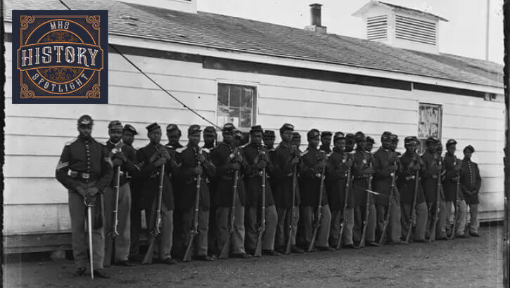 A photo of Maj. (Dr.) Alexander Augusta among the Seventh Regiment of U.S. Colored Troops where he served as regimental surgeon during the Civil War. 
