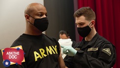 Spc. Andrew Buchtan, 1-4 Infantry Regiment medic, vaccinates Command Sgt. Maj. Deondre Long, Battalion Command Sergeant Major of 1-4 Infantry Regiment. Long said “I got the vaccination shot today because I did not want my leadership style to change. I am an engaged leader. The shot will enable me to develop a better relationship with my soldiers. It will help better interact with them without a standoffish leadership.” (US Army photo by Sgt. Julian Padua).