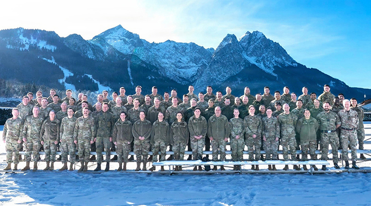 More than 112 military dental practitioners pose for a picture