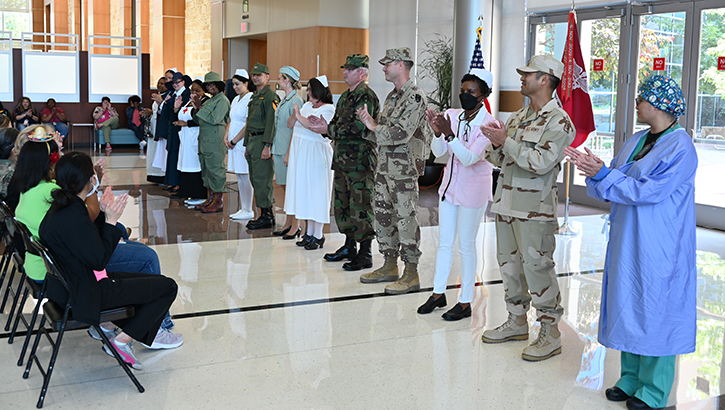 Carl R. Darnall Army Medical Center nurses model military and civilian nursing uniforms from many different eras during a ceremony that kicked off Nurses Week April 5. (Photo By Rodney Jackson)