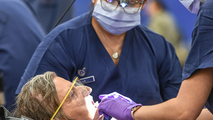 U.S. Air Force Capt. Bethanie Swanson, a dentist, and Tech. Sgt. Omalee Vega, the noncommissioned officer in charge, both assigned to the 55th Medical Group, Offutt Air Force Base, Nebraska, conduct a dental examination during Operation Healthy Delta Innovative Readiness Training Program at Anna, Illinois, on June 11, 2023. The Department of Defense-sponsored program is designed to build relationships with local communities by providing key medical, dental, and optometry services while simultaneously giving service members real-world training experience. (U.S. Air National Guard photo by Airman 1st Class Danielle Dawson)