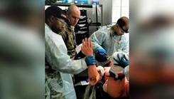 Master Sgt. Adrian Welch, center, grades Soldiers conducting trauma lane training when he was an instructor for the U.S. Army 68W Phase 3 Advanced Leaders Course. Currently serving as the Army Reserve Senior Career Management Non-Commissioned Officer at the U.S. Army Medical Center of Excellence, Welch earned two college degrees through the Medical Education and Training Campus' Degree Bridge program years after graduating from the Army’s 91W Healthcare Specialist course (now the 68W Combat Medic Specialist Training Program) in July 2003, several years before it transitioned to METC.  (Courtesy Photo)