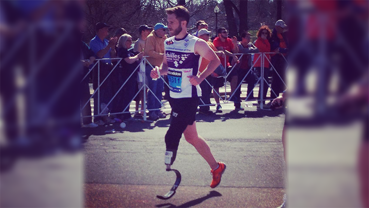 Retired U.S. Army 1st Lt. Cameron Kerr—pictured here running the 2014 Boston Marathon—was injured in an explosion that eventually led to an amputation of part of his left leg. He enrolled in the Army Recovery Care Program, where he now works. Kerr sees his position as an operations manager under the actions branch at ARCP as a full circle moment.   (Courtesy photo) 