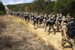 Airmen participate in the 13th Annual Fallen Defender Ruck March at Joint Base San Antonio, Nov. 6, 2020. The event honors 186 fallen security forces, security police and air police members who have made the ultimate sacrifice. Photo By: Sarayuth Pinthong, Air Force.