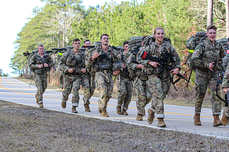 The Embry-Riddle Army ROTC Ranger Challenge team heads out on the 12-mile road march after completing the timed obstacle course event of the 6th Brigade Army ROTC Ranger Challenge January 14, 2022 at Fort Benning, Ga. The Titan Brigade’s Ranger Challenge took place at Fort Benning, Ga. January 13-15, 2022. Photo by Capt. Stephanie Snyder