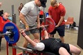 Master Sgt. Daniel Bedford prepares to pump up a gold medal lift in the bench press during the United States Powerlifting Association 2020 Texas State Bench Press Championship