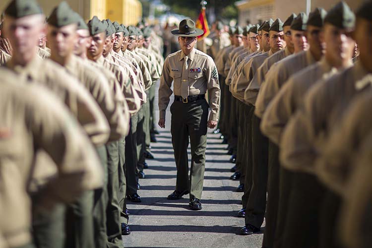 Image of A Marine Corps Staff Sgt inspects a platoon. (U.S. Marine Corps Lance Cpl. Zachary Beatty). Click to open a larger version of the image.