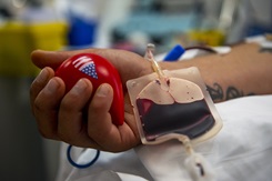 U.S. Army Staff Sgt. Brandon Sousa, 424th Engineer Vertical Construction Company, donates blood to the 379th Expeditionary Medical Group’s Blood Support Center, Aug. 30, 2021, at Al Udeid Air Base, Qatar. The blood support center conducted a walking blood bank to collect blood from prescreened and cleared donors. The blood was sent downrange to support Afghanistan evacuation operations. The DoD is committed to supporting the U.S. State Department in the departure of U.S. and allied civilian personnel from Afghanistan, and to evacuate Afghan allies to safety. (U.S. Air Force photo by Senior Airman Kylie Barrow)