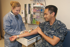 A hospitalman draws blood at Naval Medical Center Portsmouth’s Laboratory Department. DoD Photo