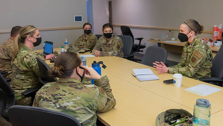 Military personnel in a meeting