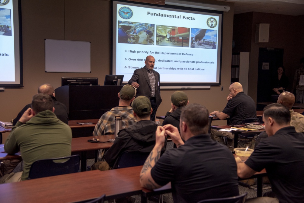 Todd Livick, Defense POW/MIA Accounting Agency Outreach and Communications director, speaks to U.S. Army Survival, Evasion, Resistance and Escape instructors about the DPAA mission at the U.S. Army S.E.R.E. school, Fort Rucker, Alabama. The DPAA and the Armed Forces Medical Examiner System provided information on their respective missions and held question and answer session with the Soldiers to provide a better understanding about the two agencies. (U.S. Air Force photo by Staff Sgt. Nicole Leidholm)