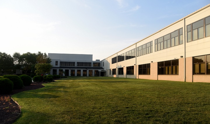 A view of the Armed Forces Medical Examiner System facility is shown July 21, 2017, on Dover Air Force Base, Delaware. Pursuant to a Base Relocation and Closure, the new AFMES facility was constructed adjoined with the Charles C. Carson Center for Mortuary Affairs. Prior to the BRAC, AFMES called Rockville, Maryland, home. (U.S. Air Force photo by Senior Airman Ashlin Federick)