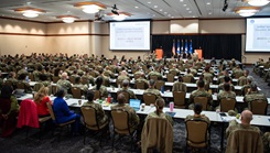 Lt. Gen. John DeGoes, Surgeon General and Commander, Air Force Medical Command, Headquarters U.S. Air Force and U.S. Space Force and Chief Master Sgt. James Woods, Chief, Medical Enlisted Force and Enlisted Corps, welcome nearly 500 attendees to the Air Force Medical Service’s 2025 Senior Leadership Workshop