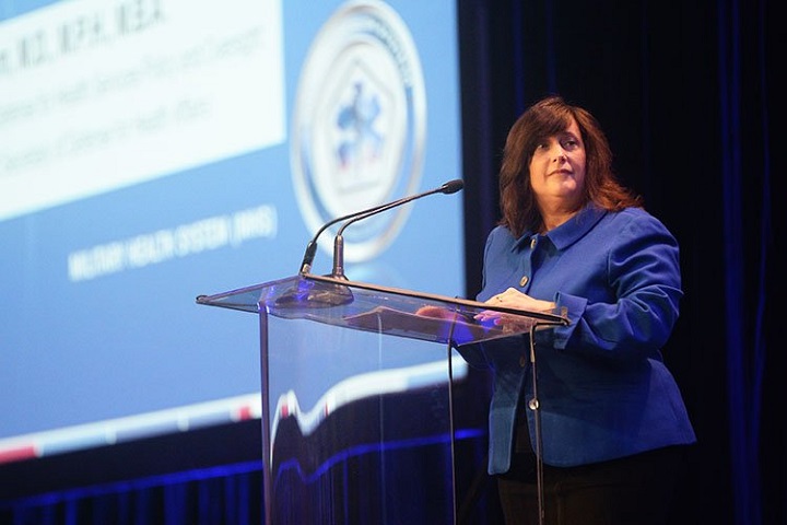 Dr. Terry Adirim, deputy assistant secretary of defense for Health Services Policy and Oversight, speaks at a plenary session at the 2018 Military Health System Research Symposium, Aug. 20, at the Gaylord Palms Resort and Convention Center in Kissimmee, Florida. The theme of this yearâ€™s meeting is â€œMedical Innovation for Warfighter Readiness: The Future Starts Now.â€ (MHSRS photo)