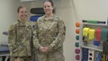 Military personnel standing beside each other posing for a picture