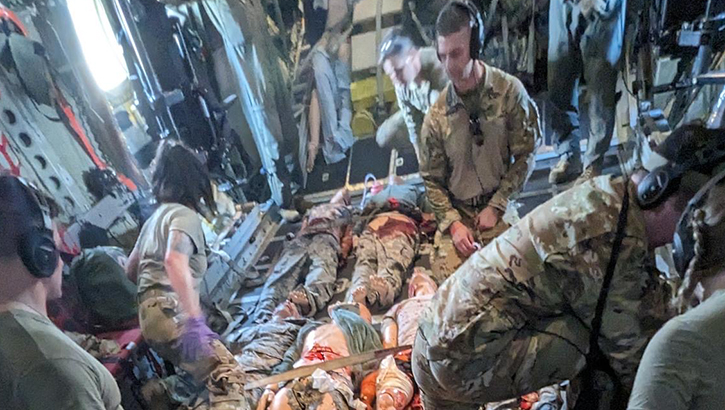 U.S. Air Force Air Mobility Command Aircrew members assigned to the Training and Operations Branch, perform lifesaving treatments on moulage patients during a Joint Force Aeromedical Evacuation training at Yokota Air Base, Japan, on July 16, 2023. (Photo: U.S. Air Force Master Sgt. Todd Olsson)