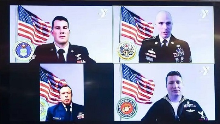 Image of Four military personnel shown during a Zoom call. Click to open a larger version of the image.