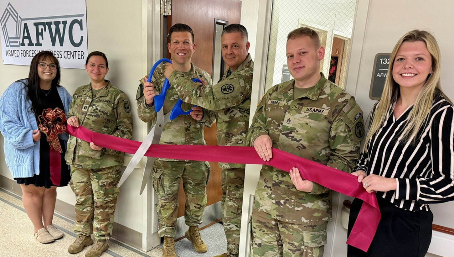 From left, Gabrielle Chedester, Armed Forces Wellness Center health educator; Capt. Brianna Kearney; Col. Patrick W. Miller; Command Sgt. Maj. Victor M. Contreras Jr.; Staff Sgt. Zachary Vikara, preventive medicine NCO; and Cala Dansby, health promotion technician, cut the ribbon during the Armed Forces Wellness Center grand opening at Bayne-Jones Army Community Hospital