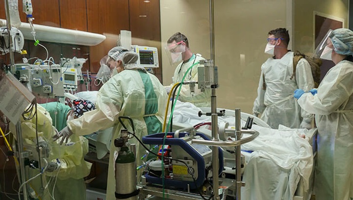 Image of Trauma personnel receive an extracorporeal membrane oxygenation or ECMO patient into the Emergency Department at Brooke Army Medical Center, Joint Base San Antonio-Fort Sam Houston, Texas, Jan. 24, 2022. MHS GENESIS new functionalities support BAMC’s Level I Trauma Center. (Photo: Corey Toye, Brooke Army Medical Center).