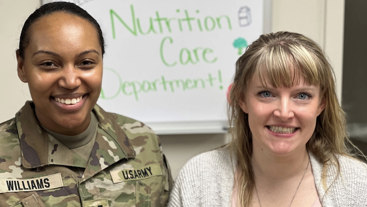 Capt. Aireal Williams, chief of nutrition care division, and Holly Seager, both registered dieticians at Bayne-Jones Army Community Hospital raise awareness during National Nutrition Month about making informed food choices, developing healthful eating habits, and educating patients on the role registered dieticians and nutrition and dietetic technicians play on their healthcare team at the Joint Readiness Training Center and Fort Johnson, Louisiana (Photo: Jean Graves)