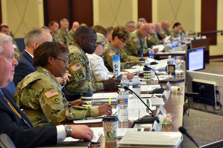 Leaders from across the Department of Defense, the Army and Fort Bragg meet at U.S. Army Forces Command headquarters July 19, 2018, to discuss the upcoming transition of the administration and management of Womack Army Medical Center from the U.S. Army Medical Command to the Defense Health Agency. (U.S. Army photo by Eve Meinhardt)